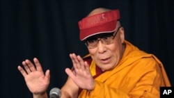 The Dalai Lama speaks during during a press conference after the first of his teaching sessions May 20, 2010 at Radio City Hall in New York. The Dalai Lama is on a four-day visit to New York. AFP PHOTO/Stan Honda