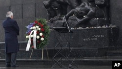U.S. Secretary of State Rex Tillerson lays a wreath during a ceremony at the Warsaw Ghetto Uprising 1943 memorial marking International Holocaust Remembrance Day, in Warsaw, Poland, Jan. 27, 2018.