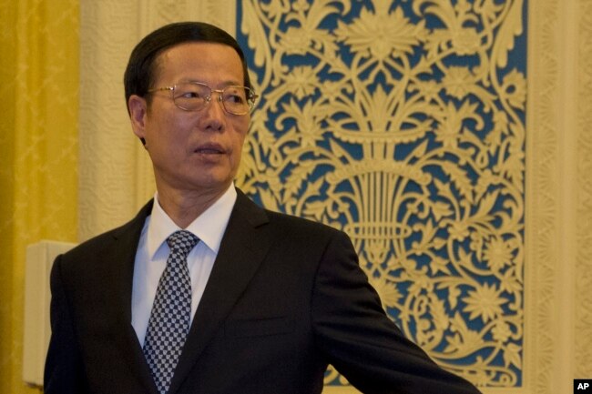 FILE - Then Chinese Vice Premier Zhang Gaoli is seen during a meeting at the Great Hall of the People in Beijing, China, March 16, 2016.