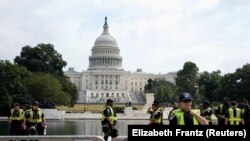 Здание Конгресса США в Вашингтоне под охраной (архивное фото REUTERS / Elizabeth Frantz)
