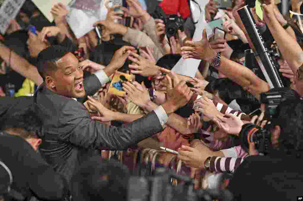 U.S. actor Will Smith meets with fans during an event to promote his movie &quot;After Earth&quot; in Taipei, Taiwan. 