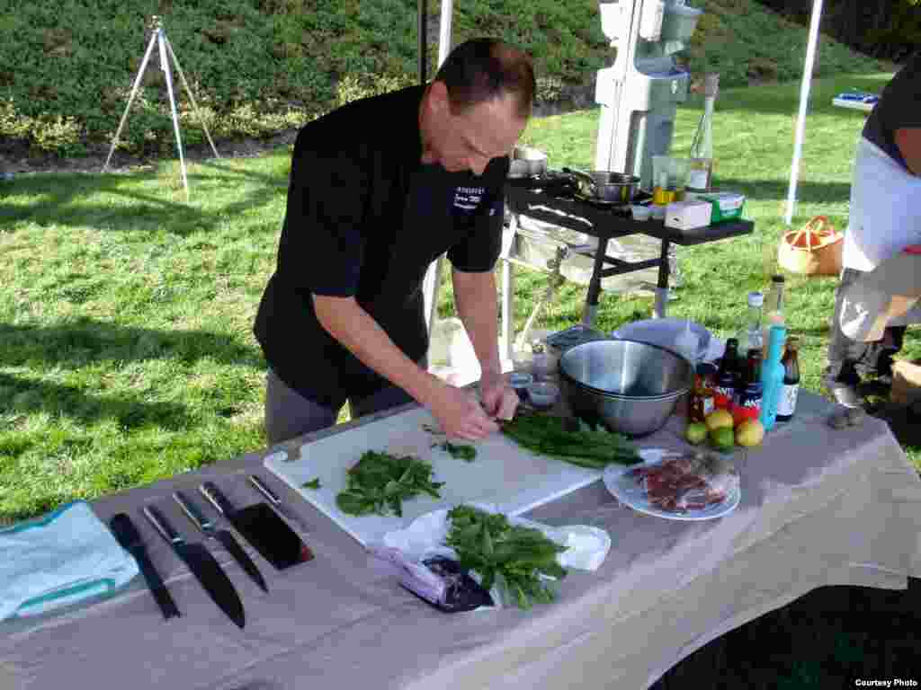 Chef Ryan Morgan of Portland competes in the invasive species cook-off. (Tom Banse) 