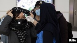 تصویر مزبوط به بررسی مسافران در ورودی فرودگاه بین المللی امام خمینی