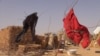 Residents dry clothes in Assaga camp, Niger, March 3, 2016. (N. Pinault/VOA)