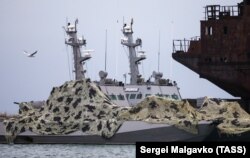 Ukrainian naval ships, which were recently seized by Russia's FSB security service, are seen anchored in a port in Kerch, Crimea, December 5, 2018