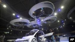 Pop.Up Next, a prototype designed by Audi, Airbus and Italdesign is displayed at the Amsterdam Drone Week in Amsterdam, Netherlands, Tuesday, Nov. 27, 2018. 