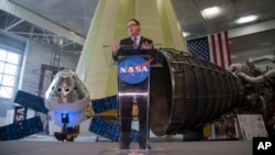 In his image released by NASA, acting NASA Administrator Robert Lightfoot discusses the fiscal year 2019 budget proposal during a State of NASA address Monday, Feb. 12, 2018 at NASA's Marshall Space Flight Center in Huntsville, Alabama.