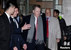 U.S. trade representative Robert Lighthizer, center, a member of the U.S. trade delegation to China, arrives at a hotel in Beijing, China, Feb. 12, 2019.