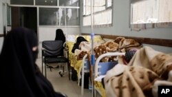 Women are treated for suspected cholera infection at a hospital in Sana'a, Yemen, Mar. 28, 2019.