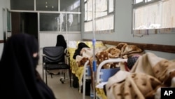 Women are treated for suspected cholera infection at a hospital in Sana'a, Yemen, Mar. 28, 2019.