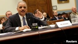 U.S. Attorney General Eric Holder testifies before a House Judiciary Committee hearing on "Oversight of the United States Department of Justice" on Capitol Hill in Washington May 15, 2013.