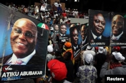 Supporters of the People's Democratic Party (PDP) attend a campaign rally in Lagos, Feb. 12, 2019.