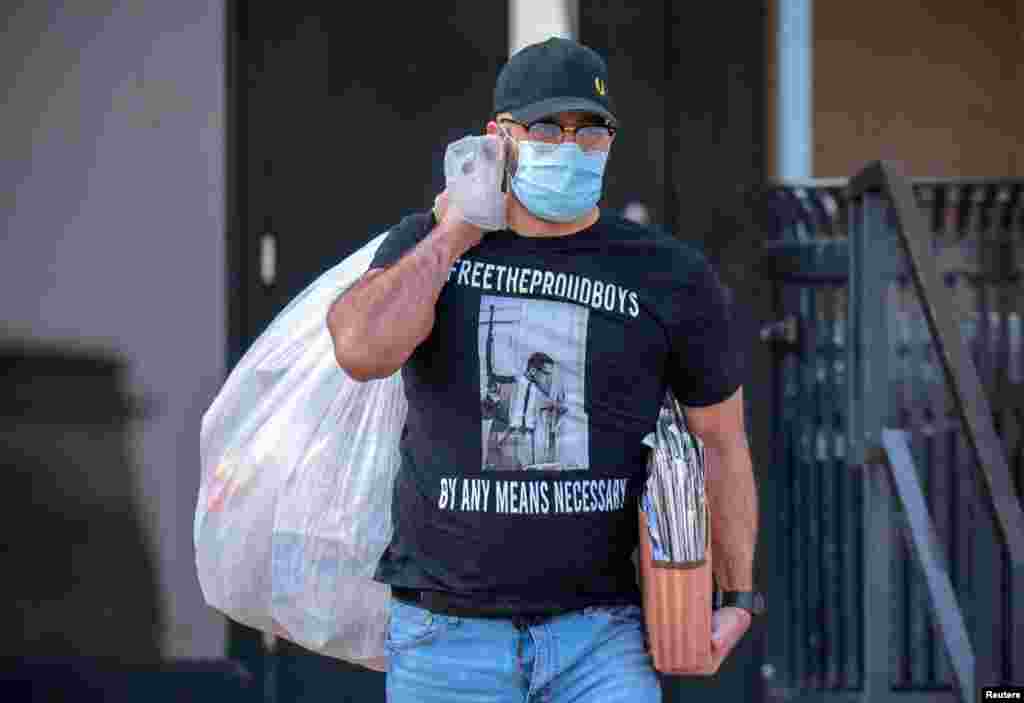 Proud Boys leader Enrique Tarrio leaves the D.C. Central Detention Facility where he had been held since September 2021, in Washington.