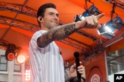 FILE - Adam Levine from the band Maroon 5 performs on NBC's "Today" show.