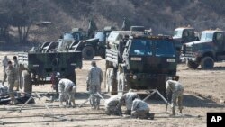 U.S. Army soldiers prepare for military exercises near the North Korea border in Paju, South Korea, March 6, 2017.