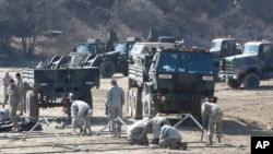 U.S. Army soldiers prepare for military exercises near the North Korea border in Paju, South Korea, March 6, 2017.