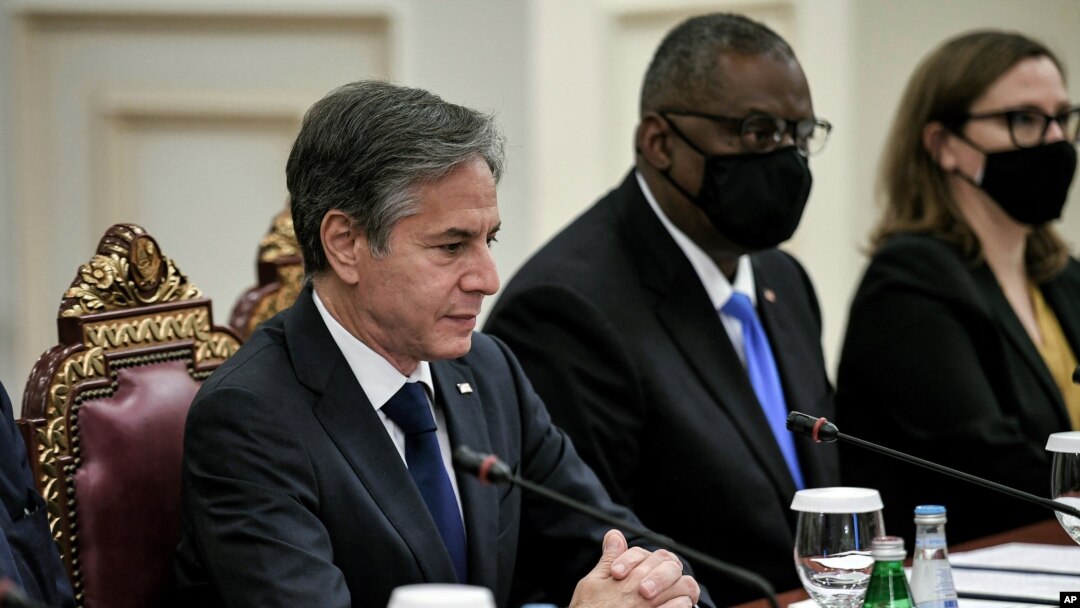 US Secretary of State Antony Blinken, left and Secretary of Defense Lloyd Austin, second right, meet with Qatari Deputy Prime Minister and others in Doha, Qatar, Sept. 7, 2021. 