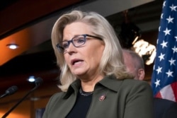 FILE - Rep. Liz Cheney, R-Wyo., speaks with reporters at the Capitol in Washington, Dec. 17, 2019.