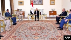 Handout picture released by the Egyptian Presidency on July 29, 2019 shows Egyptian President Abdel Fattah al-Sisi (C) meeting with Sudanese Deputy head of the Transitional Military Council, General Mohamed Hamdan Daglo (4th-R) in Cairo.