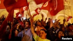 Une manifestation à Tunis, en Tunisie, le 17 juillet 2014.