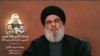 ဟက်ဇ်ဘိုလာအကြီးအကဲ Hassan Nasrallah ဟက်ဇ်ဘိုလာ အယ်လ် မဲန်နာ ရုပ်သံ မိန့်ခွန်းပြောကြားနေစဥ်။ (ဇွန် ၁၉၊ ၂၀၂၄) 
