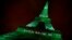 FILE - The Eiffel tower is illuminated in green with the words "Paris Agreement is Done," to celebrate the Paris U.N. Climate Change agreement in Paris, France, Nov. 4, 2016. While U.S. President Donald Trump has since expressed opposition to the agreement, Syria has joined the pact.