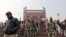 Police patrol the steps of Jama Masjid before Friday prayers in the old quarters of Delhi, India, Dec. 27, 2019. 