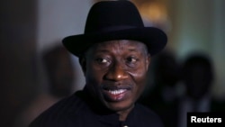 FILE - Nigerian President Goodluck Jonathan speaks to the media on the situation in Chibok and the success of the World Economic Forum in Abuja, May 9, 2014.