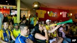 Vuvuzelas added to the festive atmosphere at Caf'e Belo when Brazil won its game