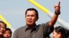 FILE - Cambodian Prime Minister Hun Sen, shown delivering a speech in Phnom Penh in January, has urged the country's new National Election Committee to be independent, saying that it does "not need to come back and seek guidance from the parties anymore."