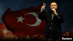 Turkish President Recep Tayyip Erdogan makes a speech during a Women's Day rally in Istanbul, Turkey, March 5, 2017. 