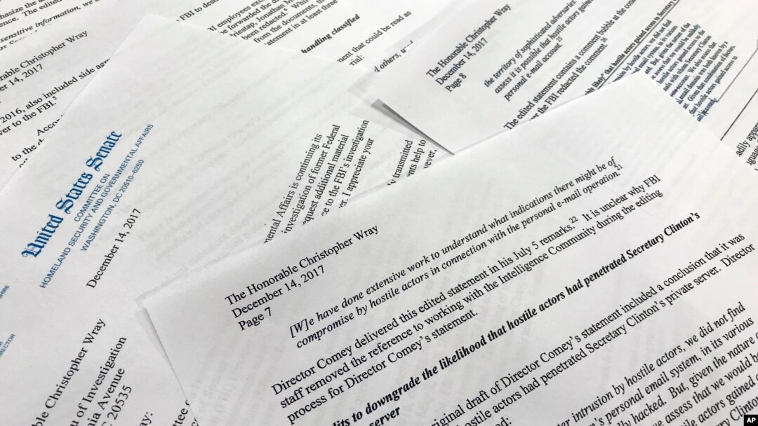 Parts of a letter written by Sen. Ron Johnson, R-Wis., to FBI Director Christopher Wray are shown in a photograph, in Washington, Dec. 14, 2017. Johnson says edits to a draft FBI statement on the Hillary Clinton email investigation appear to have watered down the significance of the bureau's findings. 