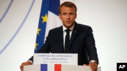 French President Emmanuel Macron delivers a speech during the annual French ambassadors' conference at the Elysee Palace in Paris, France, Aug. 27, 2018.