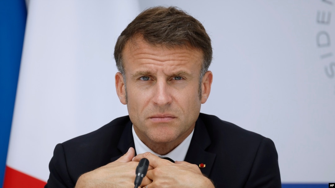 FILE - European Union officials criticized France's public debt on June 19, 2024, as French President Emmanuel Macron, shown here at the Elysee Palace in Paris on May 21, 2024, is in a tight parliamentary election race with the far right and left.