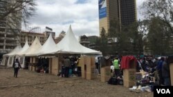 FILE - Cardboard voting booths are seen at a parking lot that has been temporarily converted into polling center, in downtown Nairobi, Kenya, Aug. 8, 2017. (J. Craig/VOA)