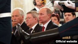 Alexandr Torshin next to Vladimir Putin at the state ceremony in the Kremlin, June 2011