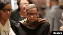 FILE - U.S. Supreme Court Associate Justice Ruth Bader Ginsburg arrives to watch U.S. President Barack Obama's State of the Union address to a joint session of Congress in Washington, Jan. 12, 2016. 