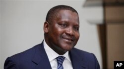 Hamshakin attajirin nan na Afirka Aliku Dangote.