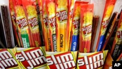 FILE - Slim Jim beef sticks stand on a shelf at a Shell gas station mini-mart in Bainbridge Twp., Ohio, March 24, 2010. Alonzo "Lon" T. Adams II, who created the formula for the snack, has died from complications of COVID-19.