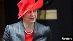 Britain's Prime Minister Theresa May leaves 10 Downing Street in London, March 12, 2018. 