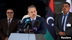 FILE: Farhat Bengdara, newly appointed as chairman of the Libyan state National Oil Corporation (NOC), looks on during a news conference in Tripoli. Taken 7.14.2022