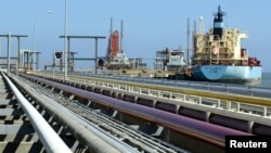 FILE - An oil tanker is seen at Jose refinery cargo terminal in Venezuela in this undated file photo. 