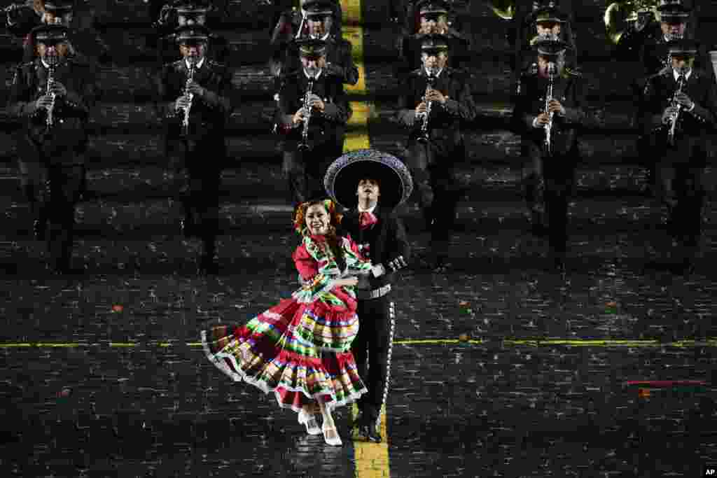A Mexican military band performs during the Spasskaya Tower International Military Music Festival in Red Square in Moscow, Russia, Thursday, Aug. 26, 2021. (AP Photo/Alexander Zemlianichenko)