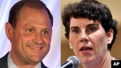 From left, Kentucky 6th congressional district candidates Republican Rep. Andy Barr and Democratic challenger Amy McGrath.