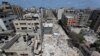 Una vista muestra el sitio de los ataques aéreos israelíes, en medio de los combates entre israelíes y palestinos, en Gaza, el 20 de mayo de 2021. REUTERS / Mohammed Salem