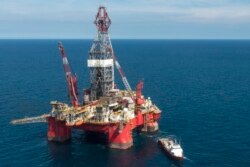 Foto udara rig eksplorasi minyak Centenario, yang dioperasikan oleh perusahaan Meksiko "Grupo R" untuk perusahaan minyak milik negara Meksiko PEMEX, di Teluk Meksiko, 30 Agustus 2013. (AFP)