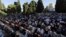 Palestinians pray in front of the Dome of the Rock shrine in Jerusalem, June 15, 2018 during the traditional morning prayer of the Muslim holiday of Eid al-Fitr.