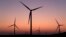 A wind farm is seen at dusk in rural Solano County, Calif., Wednesday, Aug. 30, 2023. (AP Photo/Godofredo A. Vásquez)