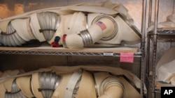 These experimental suits - along with suits that were used in space - are stored in a climate-controlled facility outside of Washington, DC.