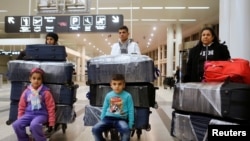 The al-Qassab family, Iraqi Christian refugees from Mosul, at Beirut international airport in Lebanon ahead of their travel to the United States, February 8, 2017.